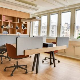 Bright office space with desk dividers